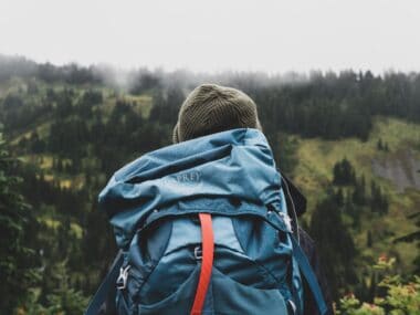 Man’s backpack ready for adventure in the wilderness