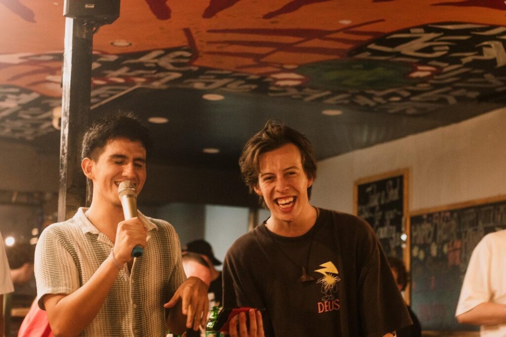 Karaoke night singing Justin Bieber in Hanoi, Vietnam. Many hostels have activities like this!